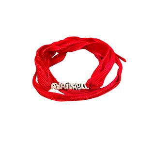 Red silk wrap with sterling silver 'AVAILABLE' charm. Silk wrap is hand made and hand dyed. Wrap length 36" Charm slides easily on to silk