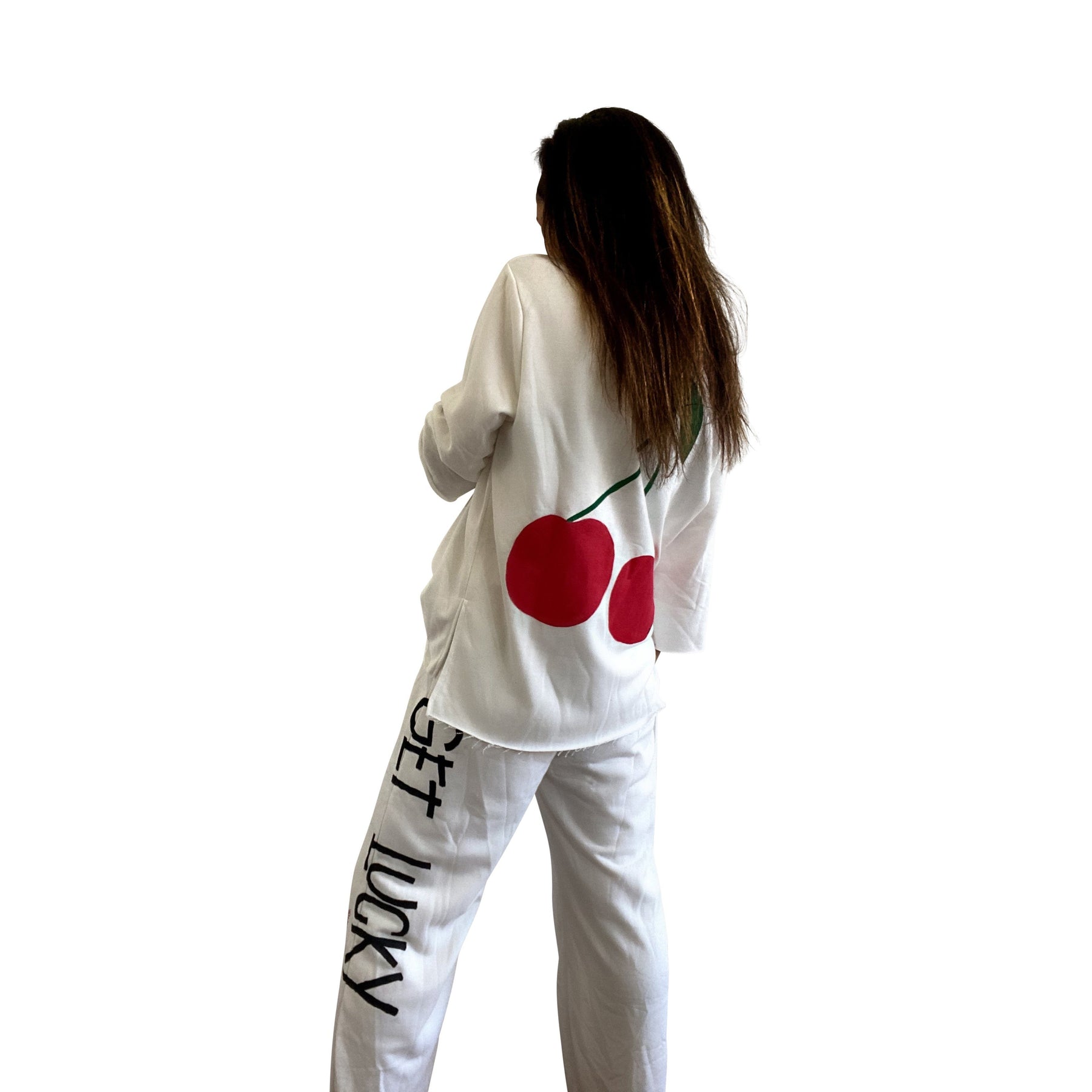 The perfect white sweatshirt & sweatpant loungewear set. Large cherries painted on back of sweatshirt, with GET LUCKY painted in black down leg of pant. Signed @wrenandglory on both top and bottom.