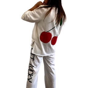 The perfect white sweatshirt & sweatpant loungewear set. Large cherries painted on back of sweatshirt, with GET LUCKY painted in black down leg of pant. Signed @wrenandglory on both top and bottom.