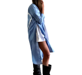 Slim fitting light blue shirt/dress, with belt. White heart with black painted drip. Can be worn as a shirt or a dress. Signed @wrenandglory.