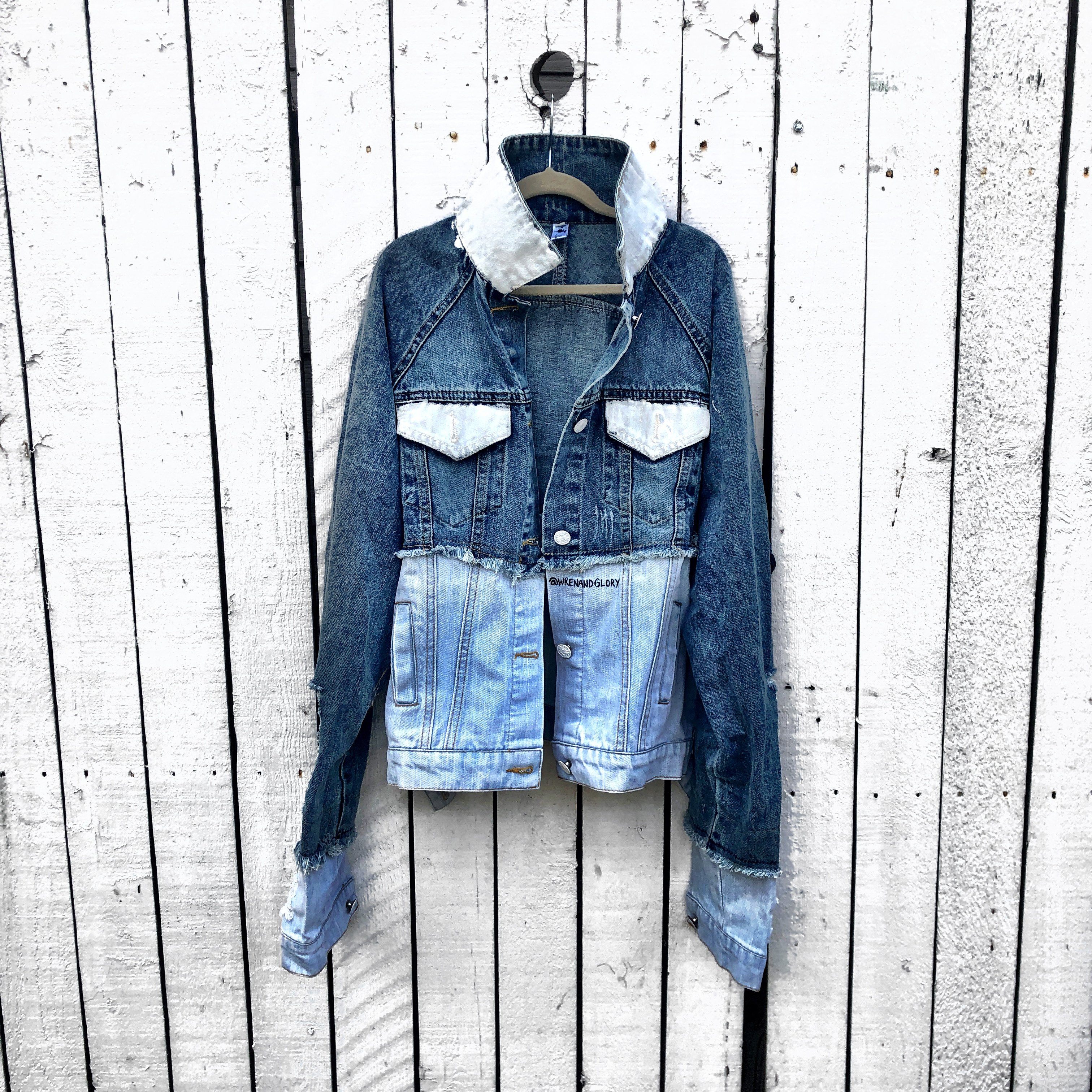 2 tone blue denim wash. BE YOURSELF. EVERYONE ELSE IS TAKEN (CROSSED OUT) AN IDIOT painted in white & black on back. Signed @wrenandglory.