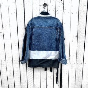 Darker blue denim with black velvet ribbons. White and black modern stripe on along entire bottom hem, collar and front pockets. Signed @wrenandglory.