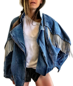 Darker blue denim wash with silver chains. 'DARLING JUST BELIEVE IN YOURSELF' painted in white script on back. Color and front pockets painted white. Signed @wrenandglory.