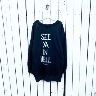 Oversized black sweatshirt. SEE YA IN HELL painted on back in white, silhouette of devil painted on front upper side.  Signed @wrenandglory.